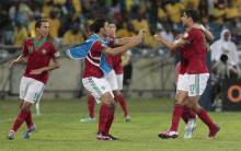 Morocco's Issam El Adoua (R) celebrates his goal against South Africa