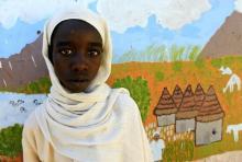 Mozdalifa Abaker Omer, a 5th grader at the Alsalam 2 School for Girls at Aboshok camps for the internally displaced persons poses for a photograph in El-Fasher, North Darfur, Sudan, November 17, 2015. PHOTO BY REUTERS/Mohamed Nureldin Abdallah