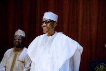 President Muhammadu Buhari smiles as he chairs his first cabinet meeting since his arrival in Abuja, Nigeria, March 15, 2017. PHOTO BY REUTERS/Stringer