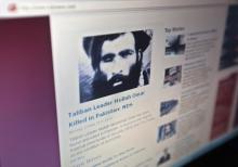 The Tolonews website runs a story on its front page reporting about news of the death of Taliban leader Mullah Mohammad Omar in Kabul, May 23, 2011. PHOTO BY REUTERS/Ahmad Masood