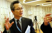 Mun Jong Chol, counselor at the North Korea mission to the U.N. in Geneva, talks with journalists aside of a meeting of the Human Rights Council at the United Nations in Geneva, Switzerland, March 24, 2017. PHOTO BY REUTERS/Denis Balibouse