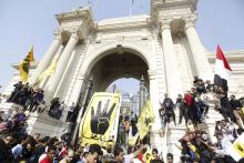 Muslim Brotherhood supporters gather in front of Qubba Palace in Cairo