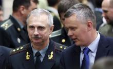 Acting Ukrainian Defense Minister Mykhailo Koval listens to Polish Defence Minister Tomasz Siemoniak (R) during a NATO defence ministers meeting at the Alliance headquarters in Brussels, June 3, 2014. PHOTO BY REUTERS/Francois Lenoir