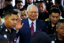 Malaysia's former Prime Minister Najib Razak leaves a courtroom in Kuala Lumpur, Malaysia, July 4, 2018. PHOTO BY REUTERS/Lai Seng Sin