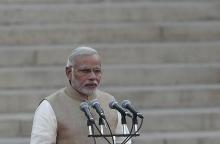 India's Prime Minister Narendra Modi takes his oath at the presidential palace in New Delhi