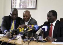 David Okeyo (L), Kipchoge Keino, and Isaiah Kiplagat, prepares to address a news conference in Kenya's capital Nairobi, May 23, 2012. PHOTO BY REUTERS/Noor Khamis