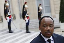 Niger's President Mahamadou Issoufou talks to journalists after a meeting with French President at the Elysee Palace in Paris