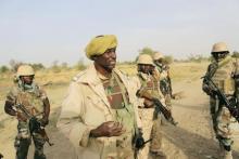 A Nigerien soldier speaks to journalists while on patrol in Duji, Nigeria, March 25, 2015. Niger seized control of the area from Boko Haram militants last month. PHOTO BY REUTERS/Joe Penney