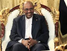 Sudan's President Omar al-Bashir smiles during an interview with the Russia Today news channel at the Presidential Palace in Khartoum, December 3, 2014. PHOTO BY REUTERS/Mohamed Nureldin Abdallah