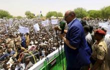 Sudanese President Omar Hassan al-Bashir addresses the crowd during a campaign rally in East Darfur, April 5, 2016. PHOTO BY REUTERS/Mohamed Nureldin Abdallah