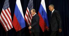 U.S. President Barack Obama and Russian President Vladimir Putin walk into a photo opportunity before their meeting at the United Nations General Assembly in New York, September 28, 2015. PHOTI BY REUTERS/Kevin Lamarque