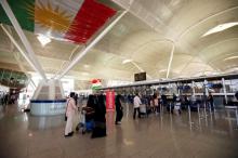 Passengers walk towards the check-in counters at Erbil International Airport, Iraq, September 27, 2017. PHOTO BY REUTERS/Azad Lashkari