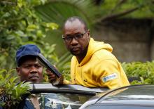 Activist Pastor Evan Mawarire is taken into a vehicle by police outside his home in Harare, Zimbabwe, January 16, 2019. PHOTO BY REUTERS/Philimon Bulawayo