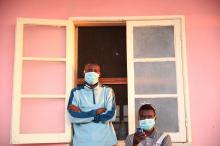 Tuberculosis patients, wearing masks to stop the spread of the disease, stand outside their ward at Chiulo Hospital, Cunene province, Angola, February 22, 2018. PHOTO BY REUTERS/Stephen Eisenhammer
