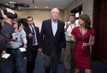 Senator Patrick Leahy (D-VT) (C) speaks to the media after attending a closed meeting for members of Congress on the situation in Syria at the U.S. Capitol in Washington