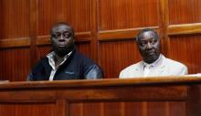 National Olympic Committee of Kenya (NOC-K) secretary general Francis Paul (R) and vice-chairman Pius Ochieng sit inside the dock at the Milimani Law court in Kenya's capital Nairobi, August 29, 2016. PHOTO BY REUTERS/Thomas Mukoya