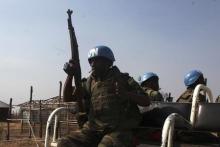 Rwandan UN peacekeepers patrol in a neighbourhood in Juba, January 20, 2014. PHOTO BY REUTERS/Andreea Campeanu