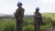 U.N. peacekeepers from Tanzania hold their weapons as they patrol outside Goma during a visit by officials from the U.N. Security Council in the eastern Democratic Republic of Congo, October 6, 2013. PHOTO BY REUTERS/Kenny Katombe