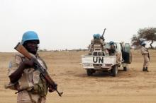 UN peacekeepers stand guard in the northern town of Kouroume, Mali, May 13, 2015. Kourome is 18 km (11 miles) south of Timbuktu. PHOTO BY REUTERS/Adama Diarra