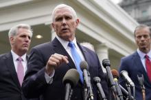 U.S. Vice President Mike Pence speaks to the news media outside the West Wing with House Minority Leader Kevin McCarthy (R-CA) and Sen. John Thune (R-SD) after a meeting with President Donald Trump and congressional leadership about the partial government shutdown at the White House in Washington, U.S., January 9, 2019. PHOTO BY REUTERS/Joshua Roberts