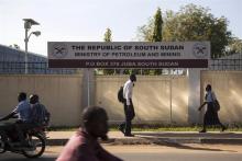 People passing by the Ministry of Petroleum and Mining in Juba