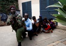 NAIROBI/MOMBASA, Kenya (Reuters) - The bomber who blew himself up outside a Nairobi hotel this month, launching an attack that killed 21 people, was already so well-known to Kenyan police that they had emblazoned his face across billboards under the slogan "WANTED: DEAD OR ALIVE".  Mahir Khalid Riziki was barely 20 when he joined a radical Islamist cell that assassinated police in his home town of Mombasa, officers said. His mosque in the coastal Kenyan city funneled recruits to the Somalia-based Islamist g