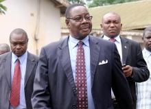 Peter Mutharika (C), as he leaves the Malawi court in Lilongwe