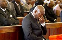 Burundi's President Pierre Nkurunziza attends the requiem mass of the late environment and water minister Emmanuel Niyonkuru, who was attacked and killed as he travelled home in the capital Bujumbura, Burundi, January 10, 2017. PHOTO BY REUTERS/Evrard Ngendakumana