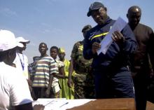 Burundi President Pierre Nkurunziza is registered by an election official before casting his ballot at a polling centre in his indigenous village of Buye in Ngozi province, northern Burundi, July 21, 2015. PHOTO BY REUTERS/Evrard Benjamin