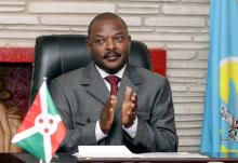 Burundi President Pierre Nkurunziza claps after signing the new constitution at the Presidential Palace, June 7, 2018. PHOTO BY REUTERS/Evrard Ngendakumana