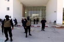 Tunisian police officers guard the entrance of the National Bardo Museum in Tunis March 19, 2015. PHOTO BY REUTERS/Anis Mili