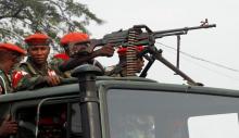 Military police officers ride on a truck as they patrol the streets of Kinshasa, Democratic Republic of Congo, June 29, 2017. PHOTO BY REUTERS/Kenny Katombe