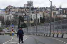 A Russian traffic police officer patrols a road in Sochi, January 30, 2014. Sochi will host the 2014 Winter Olympic Games from February 7 to February 23