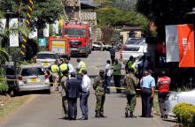 Kenyan policemen and explosives experts gather evidence from the car suspected to have been used by the attackers outside the scene where explosions and gunshots were heard at The DusitD2 complex, in Nairobi, Kenya, January 17, 2019. PHOTO BY REUTERS/Njeri Mwangi