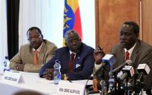 Three of the released political detainees from South Sudan (L-R) Cirino Hiteng, former Minister of Youth and Sport, Gier Chuang, and Deng Alor Kuol, former minister of cabinet affairs, address a news conference in Ethiopia's capital Addis Ababa