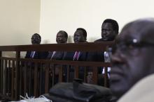 Four political prisoners, who are also former members of the ruling SPLM party, attend their court trial in Juba