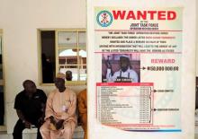 A poster advertising for the search of Boko Haram leader Abubakar Shekau is pasted on a wall in Baga village on the outskirts of Maiduguri, in the north-eastern state of Borno, Nigeria May 13, 2013. PHOTO BY REUTERS/Tim Cocks