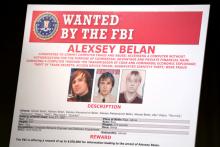 A poster of suspected Russian hackers is seen before FBI National Security Division and the U.S. Attorney's Office for the Northern District of California joint news conference at the Justice Department in Washington, U.S., March 15, 2017. PHOTO BY REUTERS/Yuri Gripas