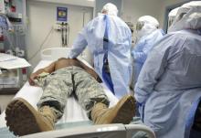 Participants practise medical procedures on a soldier during training for the Ebola response team at Fort Sam Houston in San Antonio, Texas, October 24, 2014. PHOTO BY REUTERS/Darren Abate