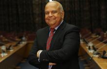 South African finance minister Pravin Gordhan poses for a photograph in Pretoria, after speaking via video link to a Thomson Reuters investment conference in Cape Town South Africa, October 14,2016. PHOTO BY REUTERS/Siphiwe Sibeko