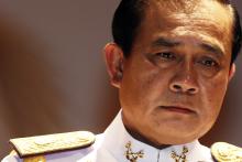 Thai Army chief General Prayuth Chan-ocha pauses as he addresses reporters at the Royal Thai Army Headquarters in Bangkok, Thailand