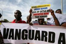 A protestor holds a placard during a demonstration against Fulani herdsmen killings, in Abuja, Nigeria, March 16, 2017. PHOTO BY REUTERS/Afolabi Sotunde
