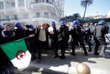 Police officers try to disperse people trying to reach the government palace during a protest against President Abdelaziz Bouteflika's plan to extend his 20-year rule by seeking a fifth term in April elections in Algiers, Algeria, March 1, 2019. PHOTO BY REUTERS/Zohra Bensemra