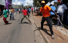 Protesters supporting opposition leader Raila Odinga use slings at the police in Kibera slum in Nairobi, Kenya, October 27, 2017. PHOTO BY REUTERS/Thomas Mukoya