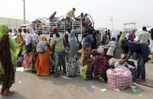 Nigerians airlifted from the Central African Republic, prepare to travel to their states across Nigeria, at Nnamdi Azikiwe International Airport in Abuja, January 6, 2014. PHOTO BY REUTERS/Afolabi Sotunde