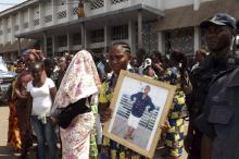 A relative of a victim killed during protests in the run-up to a constitutional referendum attends a memorial service in Brazzaville, Congo, November 2, 2015. PHOTO BY REUTERS/Roch Bouka