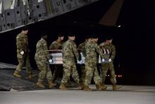 A U.S. Army carry team transfers the remains of Army Staff Sgt. Dustin Wright of Lyons, Georgia, at Dover Air Force Base in Delaware, U.S. on October 5, 2017. PHOTO BY REUTERS/Courtesy Aaron J. Jenne/U.S. Air Force