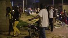 Restaurant customers run in the street following an attack by gunmen on a restaurant in Ouagadougou, Burkina Faso, in this still frame taken from video August 13, 2017. PHOTO BY REUTERS