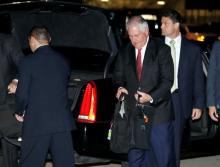 U.S. Secretary of State Rex Tillerson gathers his things to board his plane to depart for a several day Mideast trip, October 20, 2017, in Andrews Air Force Base, Md. PHOTO BY REUTERS/Alex Brandon