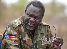 South Sudan's rebel leader Riek Machar speaks to rebel General Peter Gatdet Yaka (not seen) in a rebel controlled territory in Jonglei State